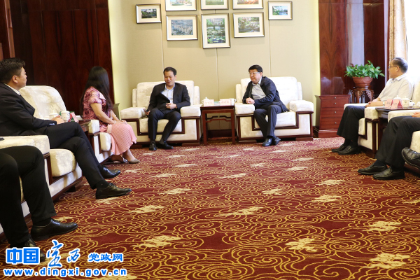 唐晓明会见恒大地产集团兰州置业有限公司董事长章为党一行